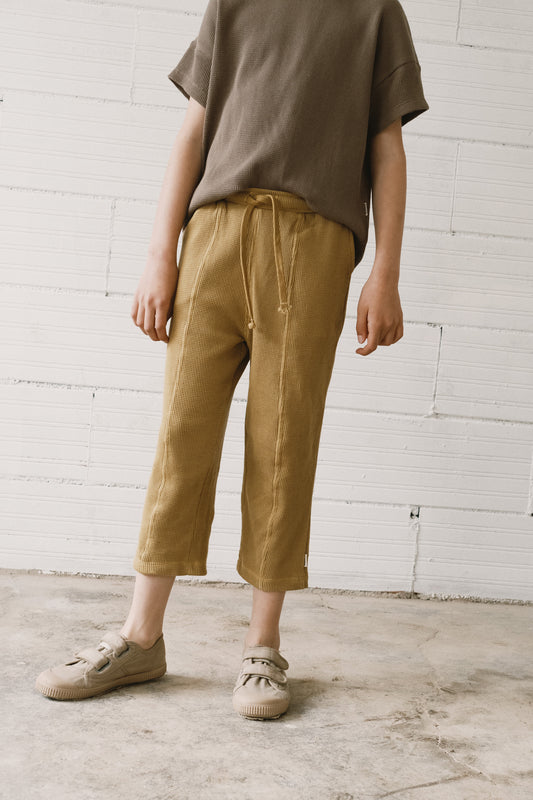 Hallow waffle organic cotton trousers in mustard