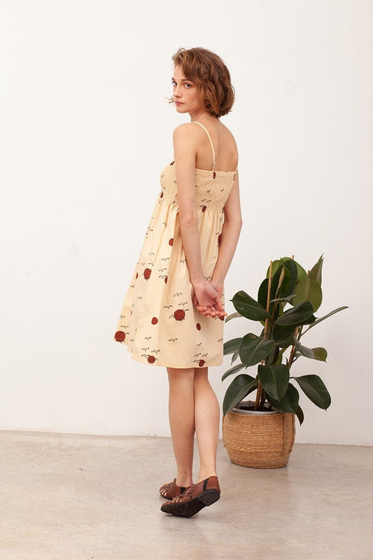 BETH's smocked dress in beige - TIRALAHILACHA