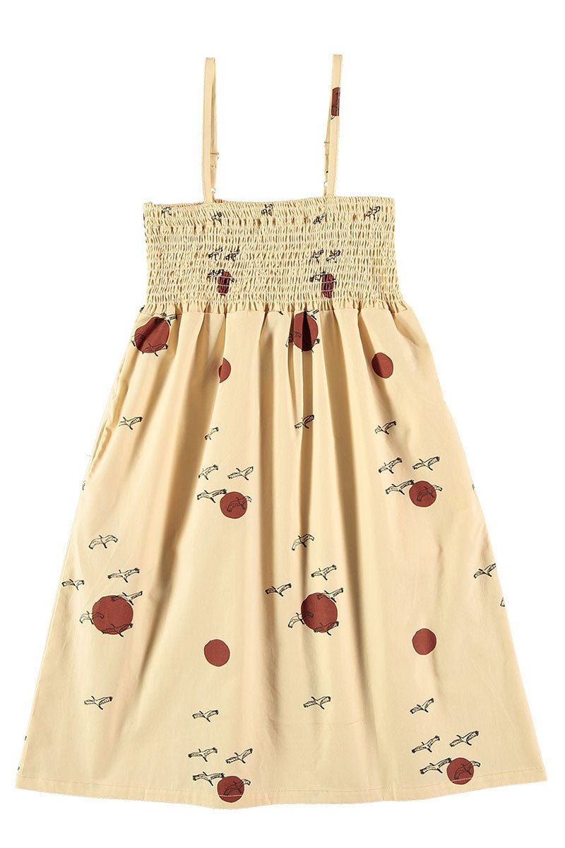 Smocked dress in beige - TIRALAHILACHA