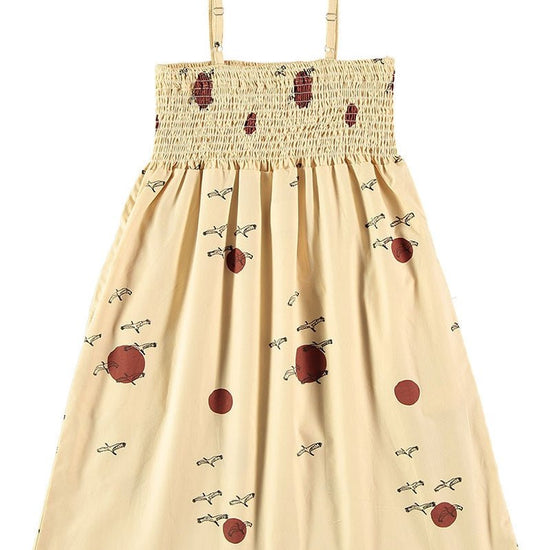 Smocked dress in beige - TIRALAHILACHA