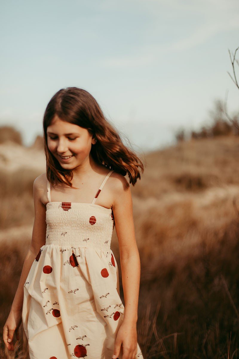 Smocked dress in beige - TIRALAHILACHA