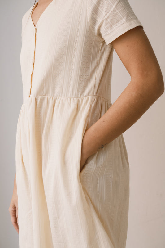 White buttoned dress