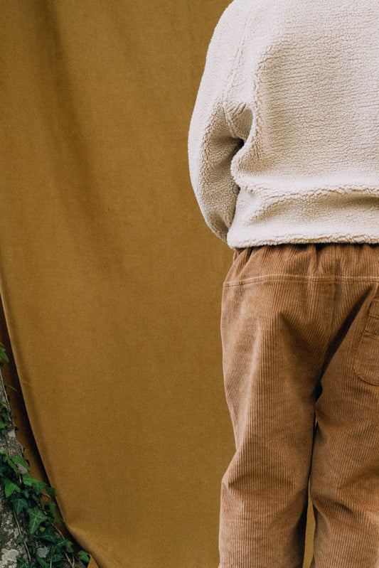 Pantalones pana oversized algodón orgánico teja